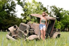 Girl Resting by Old Truck.jpg