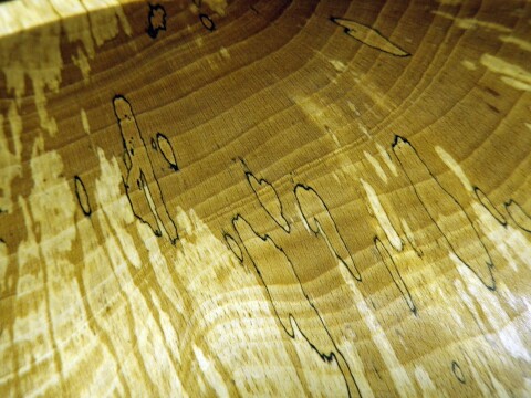 Zone-line decay, a.k.a. spalted wood, can be used for trim work as long as the wood is firm and doesn't have pockets that are punky.